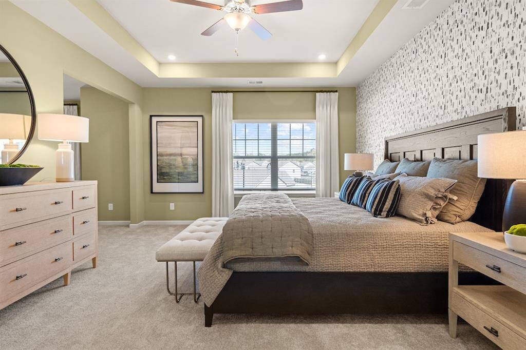The James- Primary Bedroom. Home under construction. Sample floor plan photo used for illustrative purposes only. Upgrades, selections options, windows and colors may vary.