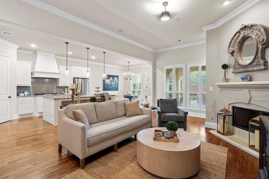The open-concept design of the great room seamlessly connects the living room to the kitchen and breakfast area, encouraging easy flow for both everyday living and entertaining.