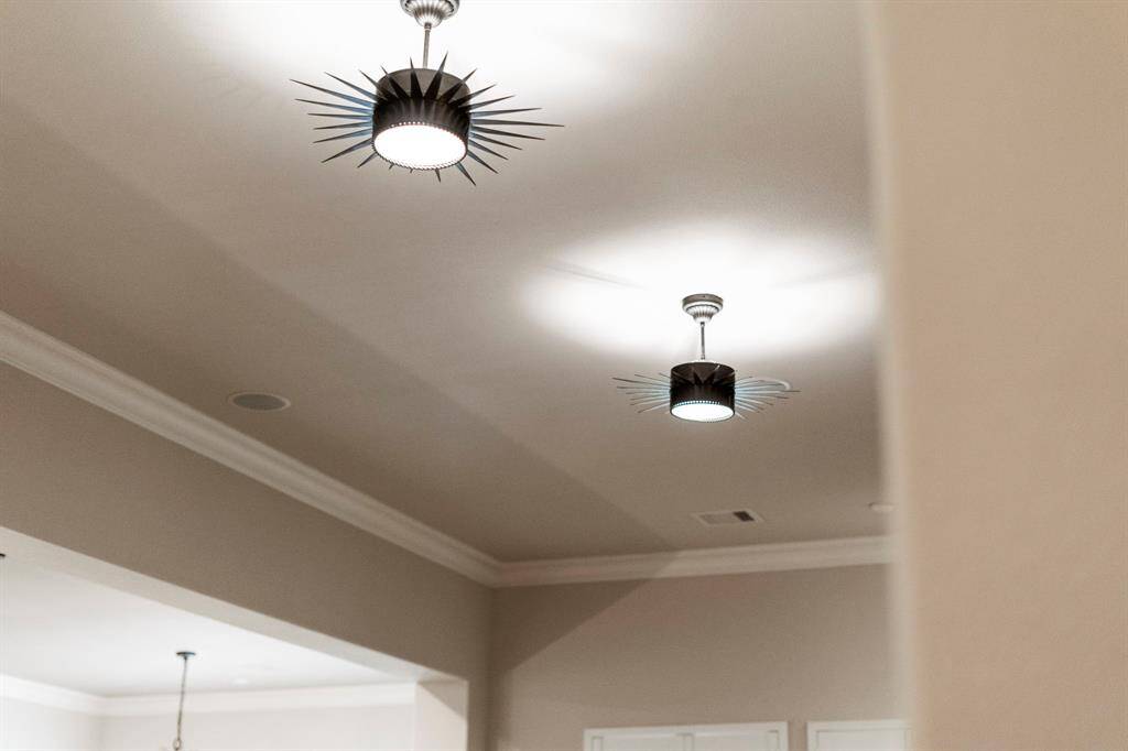 Charming Soleil pendant light fixtures add a touch of elegance, casting a soft, inviting glow that enhances the ambiance of the space.