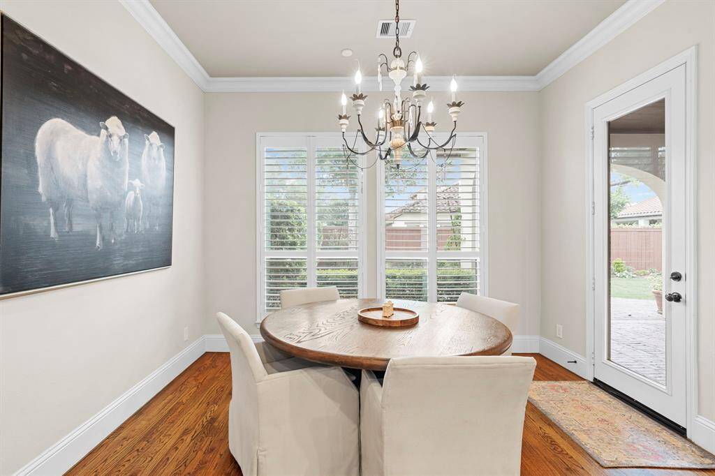 From the breakfast area, enjoy beautiful views and easy access to the outdoor living space and private backyard.