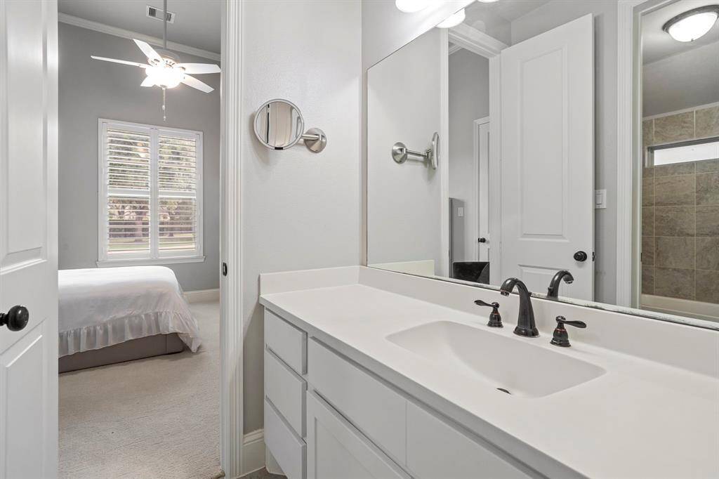 The Hollywood bathroom features a private vanity area for each adjoining bedroom, offering both convenience and personal space while sharing a central bath and shower.