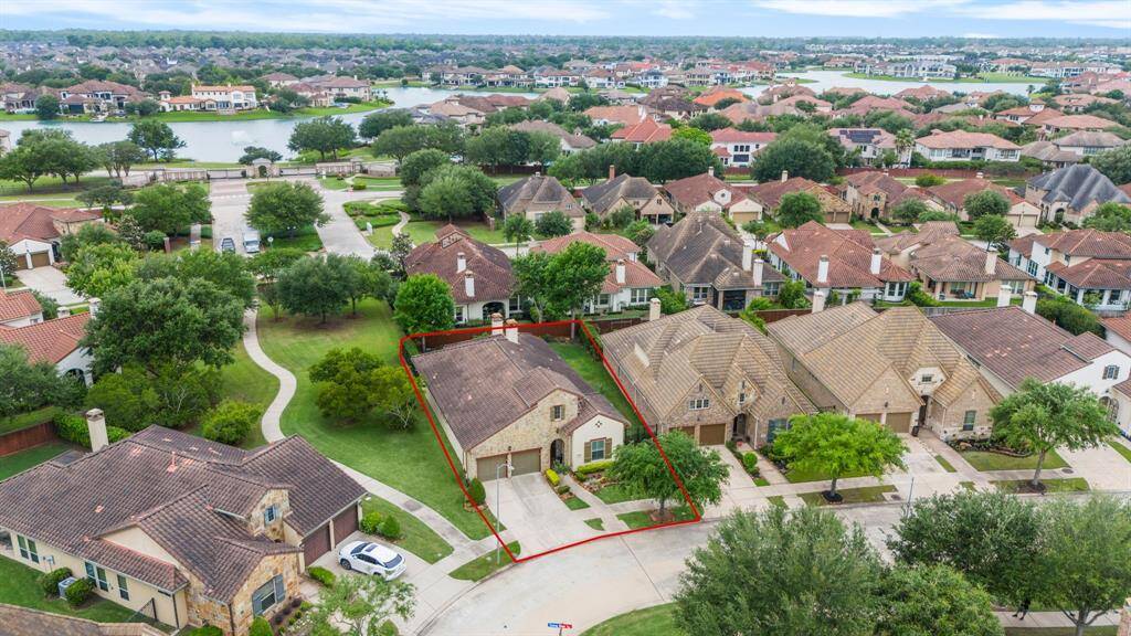 The home is ideally positioned next to a scenic walking path and green space for added privacy and tranquility.