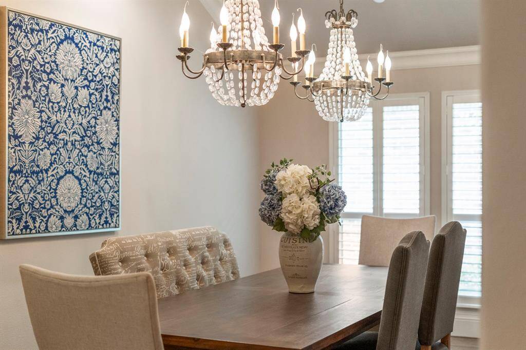 Sparkling, candle-style beaded Empire chandeliers light up the dining room, making every meal feel like a special occasion.