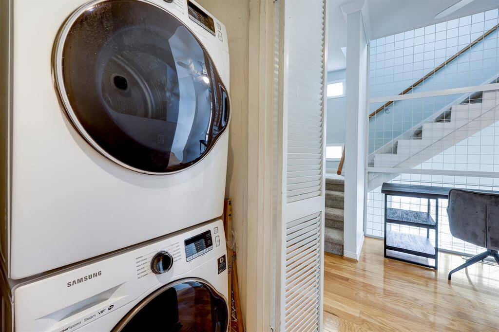 Front loading washer and dryer upstairs.