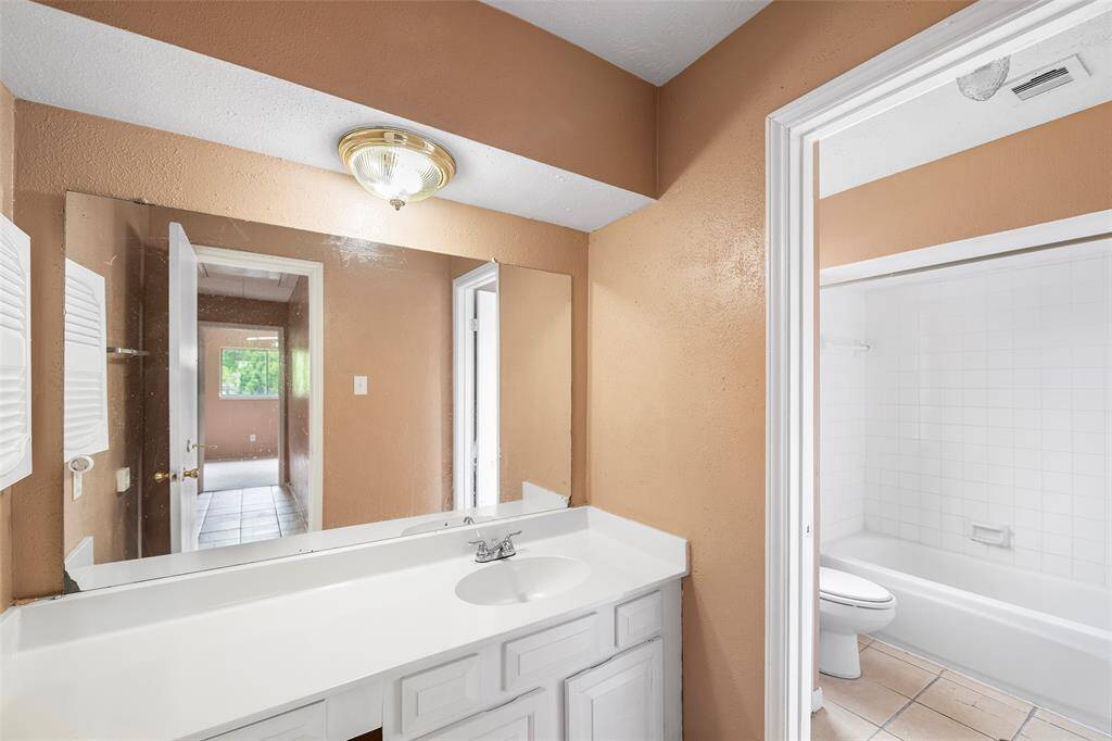 The upstairs bathroom has large a separate shower and ample counterspace to make the morning rush a breeze.