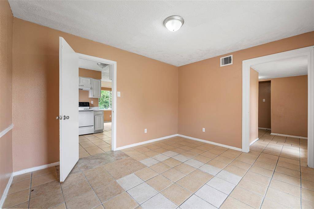 Gather in the dining area for those special meals with loved ones.  The door is direct access to the kitchen for easy serving and clean up.