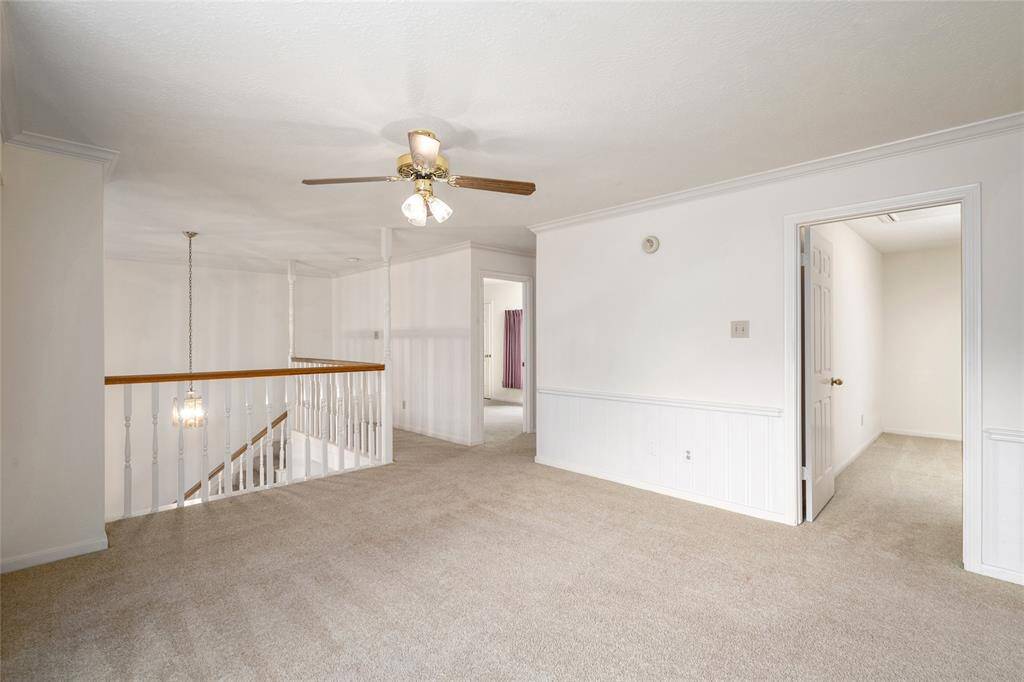 Whether you envision it as a fun game space or prefer to transform it into a cozy movie room, this versatile area provides plenty of room for your ideas. Large windows bring in natural light, while the open layout allows for easy customization to create the ultimate entertainment zone for family and friends.