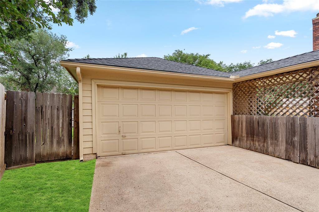 A detached 2-car garage is located at the back of the property, offering convenient access while maintaining curb appeal at the front of the home. With plenty of space for parking and additional storage, it’s ideal for vehicles, outdoor gear, or workshop needs. The setup also provides added privacy and a clean separation from the main living areas.
