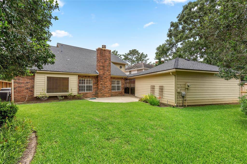 A detached 2-car garage sits at the back of the property, offering easy access and additional storage while keeping the front of the home tidy and welcoming. The spacious backyard provides plenty of room to create your own outdoor retreat—whether it’s a cozy sitting area, a BBQ setup, or space for entertaining family and friends. It's the perfect setting for weekend gatherings, casual hangouts, or simply relaxing in the fresh air.