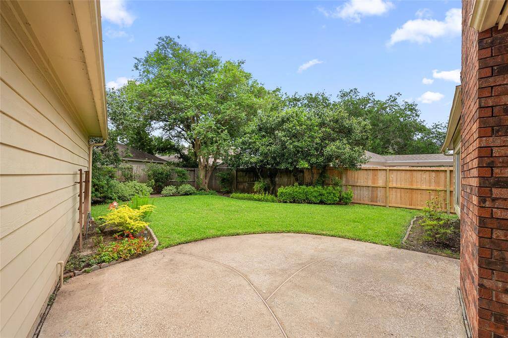 Just look at those lush green trees and well-maintained shrubs—so cool, relaxing, and refreshing to the eyes. It's the perfect view to enjoy from your backyard, creating a peaceful, nature-filled escape right at home.
