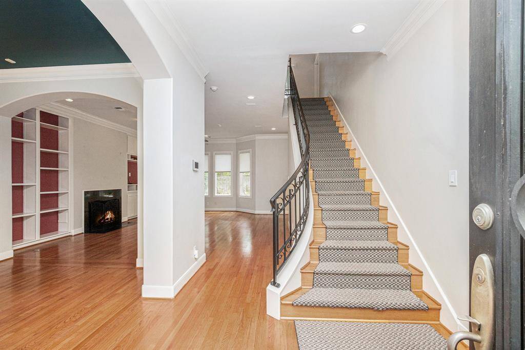 Upon entering the foyer, formal dining immediately to your left and family room beyond. Graceful staircase leads to all upstairs bedrooms.