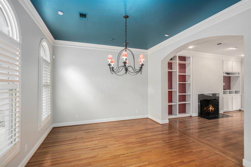 Formal dining room as seen from the foyer. Plantation shutters enhance the look of the front of the home and offer great privacy, while still being able to provide plenty of light.