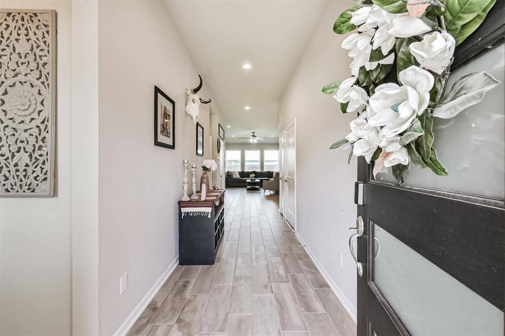 Extra Large Entry way further greets anyone entering this pristine  home.