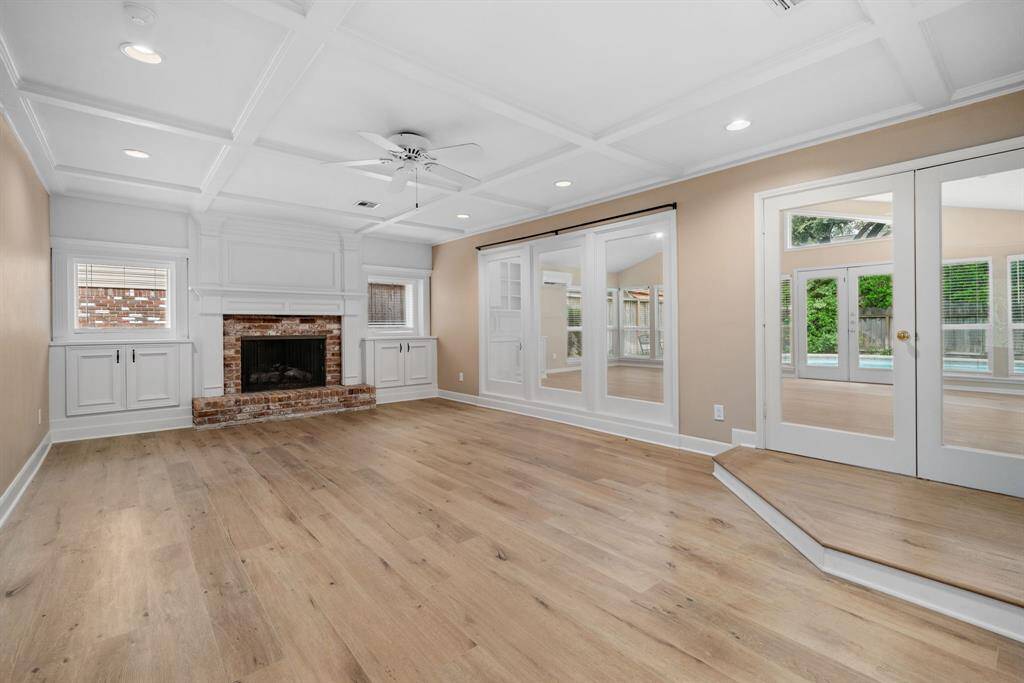 Family room opens to extra large game room overlooking pool and yard.