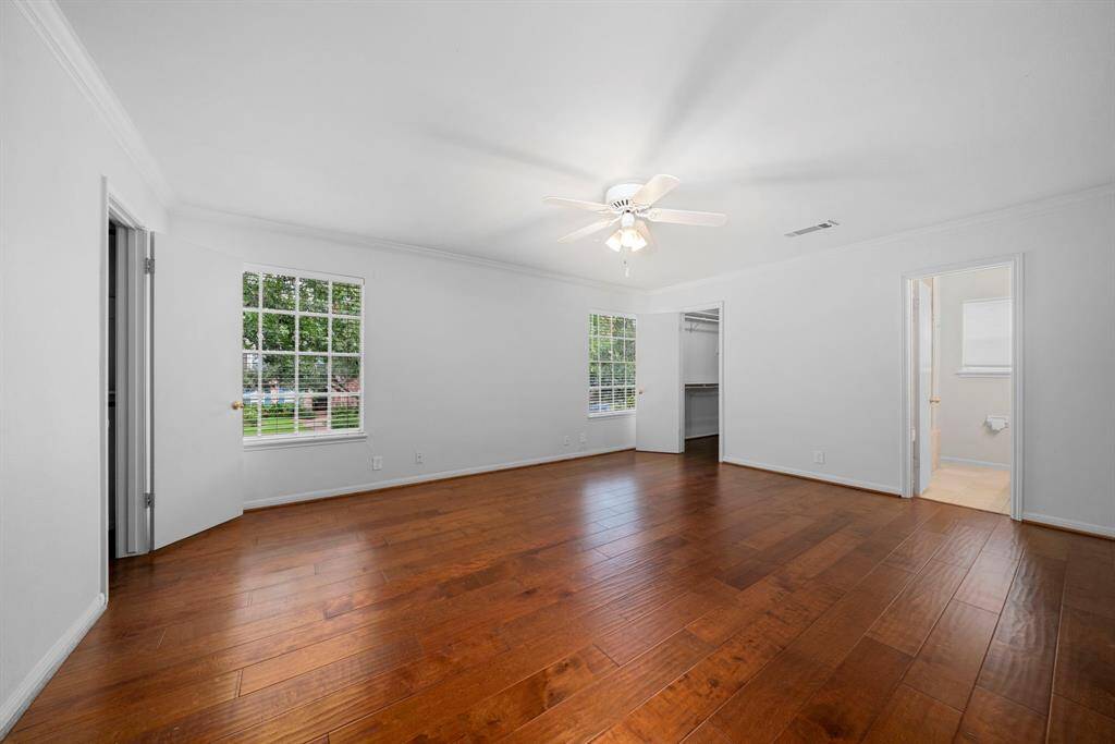 Upstairs features a large master with engineered wood floors, two walk-in closets, ensuite bath w/soaking tub.
