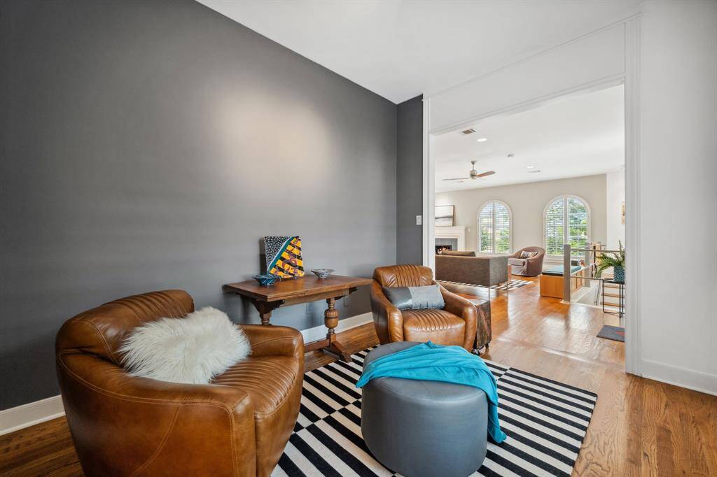 Enjoy your meals in this elegant dining room, thoughtfully placed next to the cozy gas fireplace. Whether it’s a casual dinner or a formal gathering, the warmth and ambiance of the fire create a welcoming atmosphere, making every meal feel special.