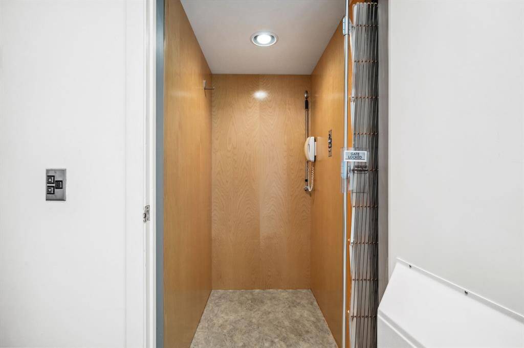 This home is equipped with a convenient elevator, making it easy to bring up groceries, luggage, or other heavy items. A perfect feature for added comfort and accessibility, enhancing the home's functionality for everyday living.