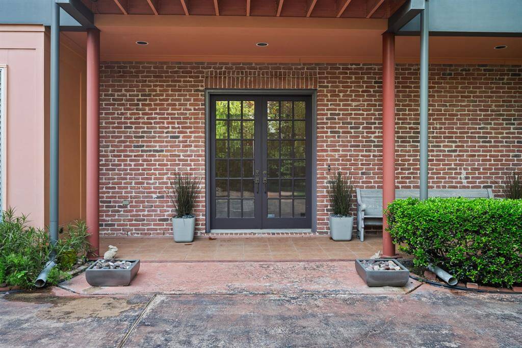 This beautifully designed, private residence showcases impressive curb appeal with a modern two-story layout and multiple balconies that invite indoor-outdoor living.