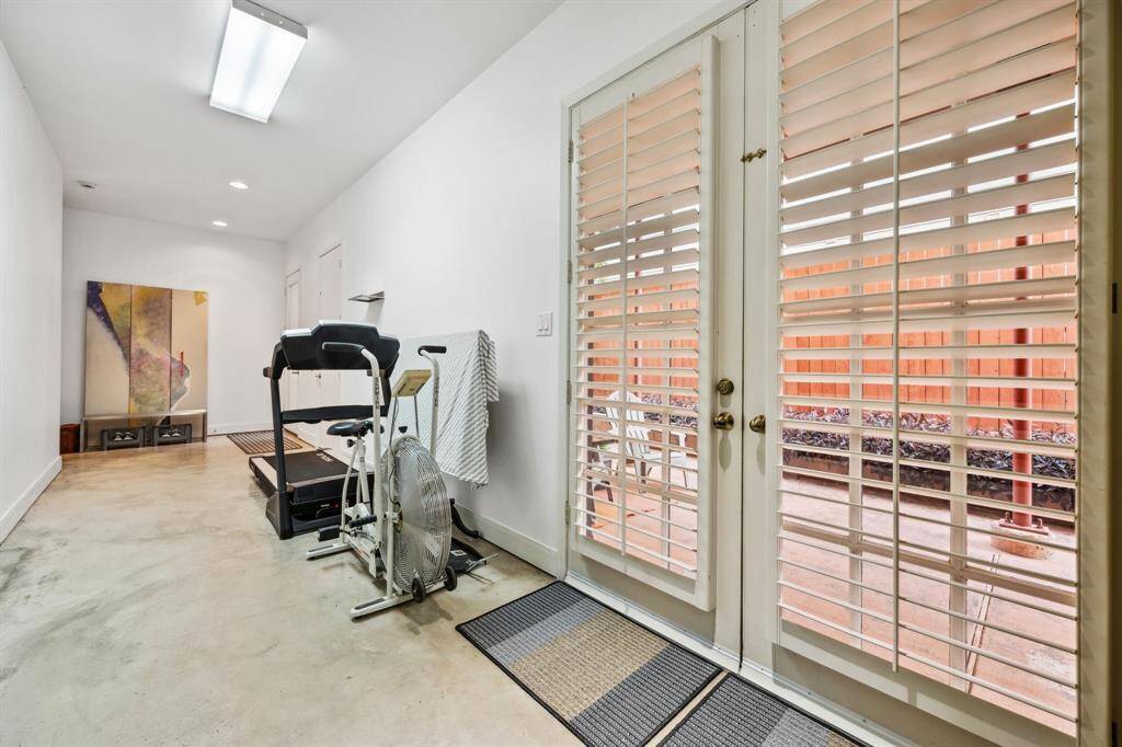 The first-floor kitchenette is a thoughtful addition, ideal for a guest suite or office space. With essential appliances and plenty of storage, it adds convenience and functionality, making it easy to accommodate guests or create a self-contained work area. Washer and dryer hookups are avialble on the frist floor as well.