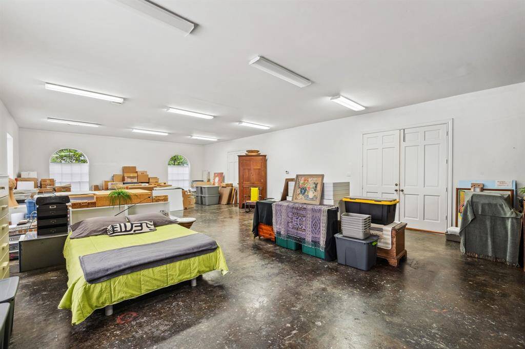 This versatile space, currently set up as a workout area, offers endless possibilities. With plenty of room to customize, it could easily be transformed into a home office, playroom, or any other functional space to suit your needs.