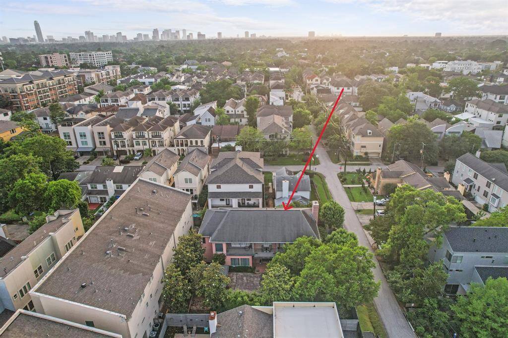This stunning freestanding home is nestled among mature trees, offering a sense of privacy, serenity, and natural beauty. The lush surroundings create a peaceful retreat while enhancing the home's curb appeal and charm.
