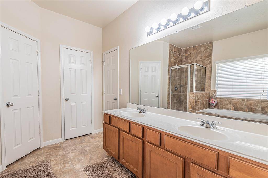 Double sinks with MASSIVE WALK IN CLOSET