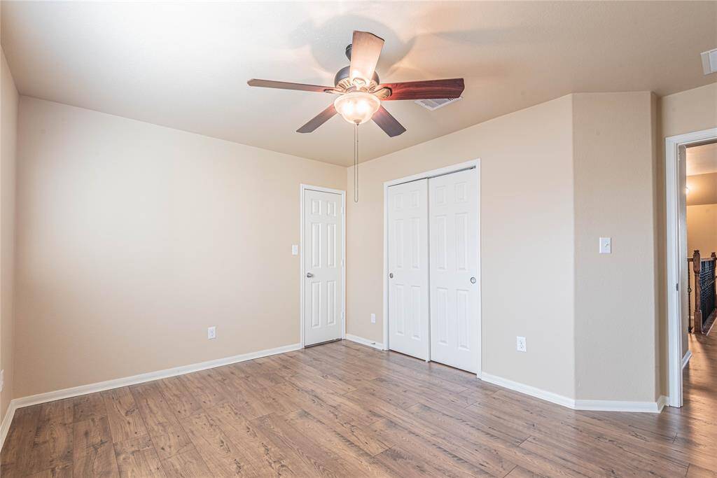 Door leads to a room that can be used for STORAGE. Enough for all your 4 seasons worth of holiday decor.