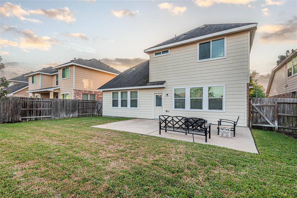 Backyard space is shaded by the home.