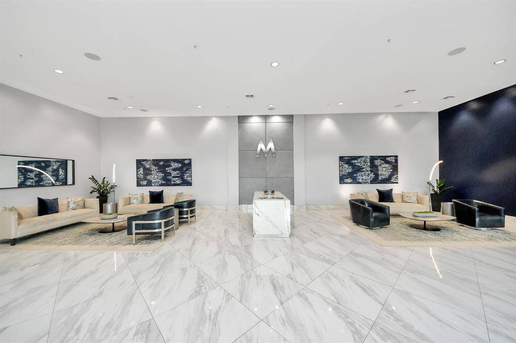 Welcome to a luxurious lobby waiting area, where style meets comfort. A serene, inviting space that sets the tone for the exceptional living experience that awaits!
