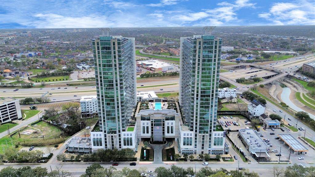 An aerial view of the iconic Mosaic Residential North in the heart of Houston’s vibrant downtown! With unbeatable views and unmatched location, you're just steps away from the city’s best dining, shopping, and entertainment.