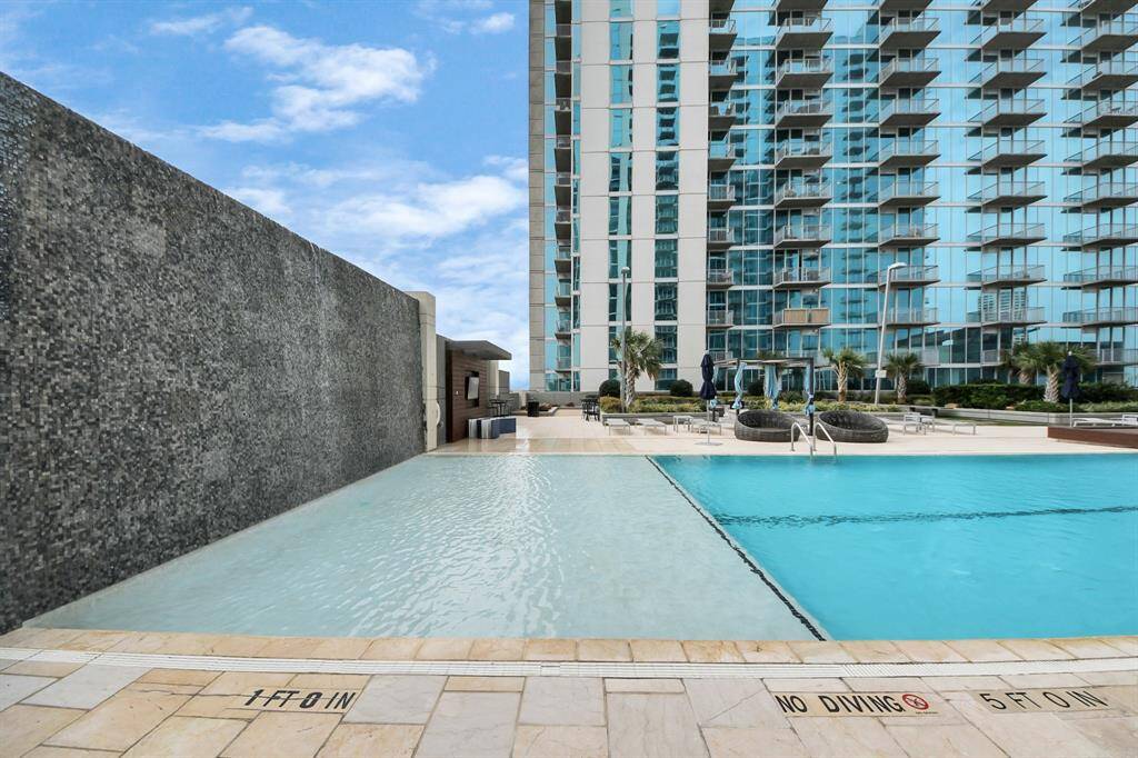 Relax by the pool and unwind to the soothing sounds of a beautiful waterfall—your perfect escape!