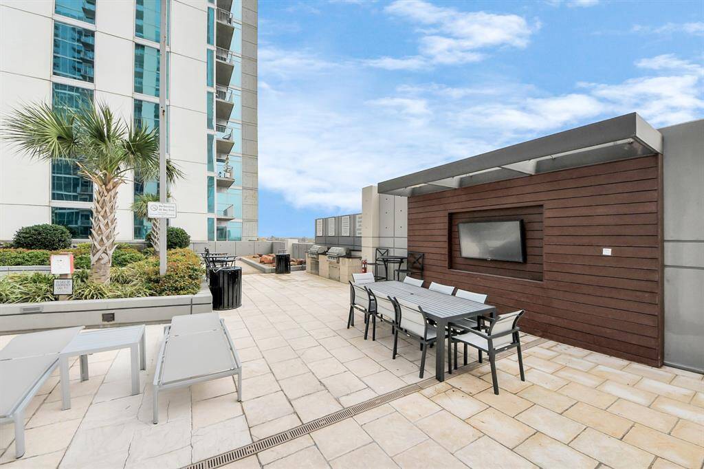 The best of both worlds—relax by the pool and catch your favorite shows with a built-in TV for ultimate convenience!