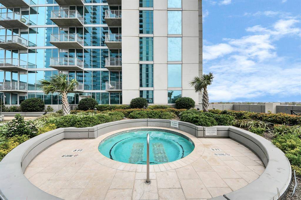 Take a dip in the hot tub and enjoy a soothing retreat in a space designed for ultimate relaxation!