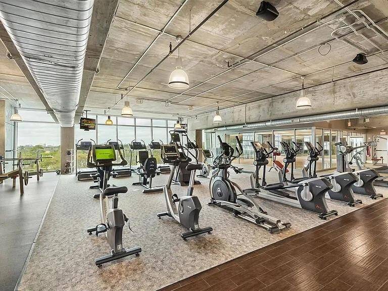 Fully equipped fitness center, featuring top-of-the-line equipment, a dedicated yoga room, boxing area, spacious workout zone, and relaxing sauna and steam rooms!