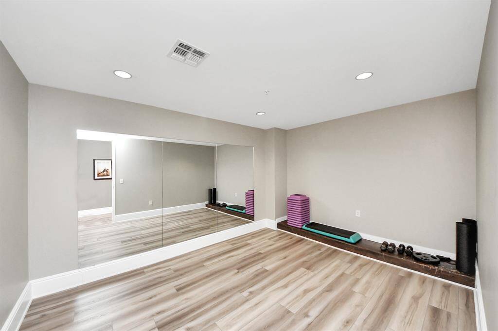 Transform your wellness routine in this serene yoga room—your personal space for peace and balance!