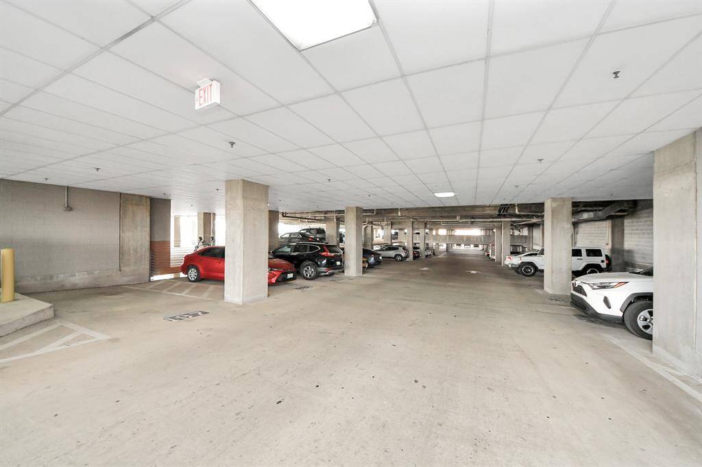Convenient and secure covered parking with assigned spots, valet service, and electric charging stations available on the 1st floor for added convenience!