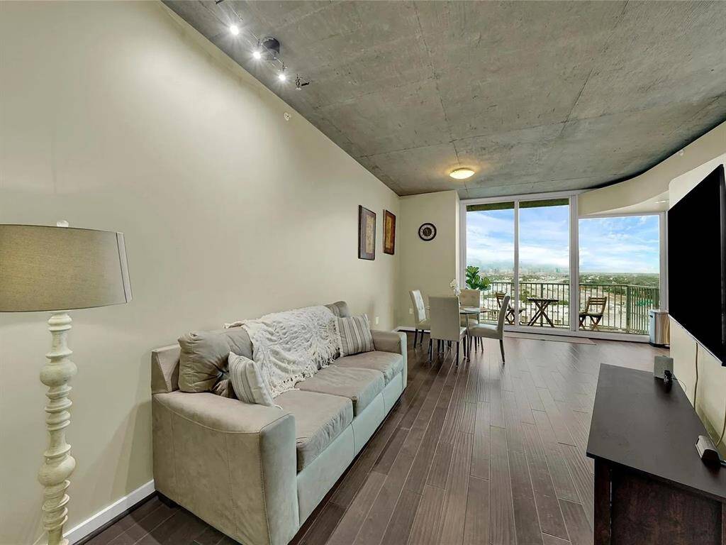 Step into this cozy 1-bed, 1-bath condo. The open layout seamlessly connects the living room, dining area, and kitchen, with sliding doors leading to your private balcony. Perfect for enjoying both indoor and outdoor living in the heart of the city!