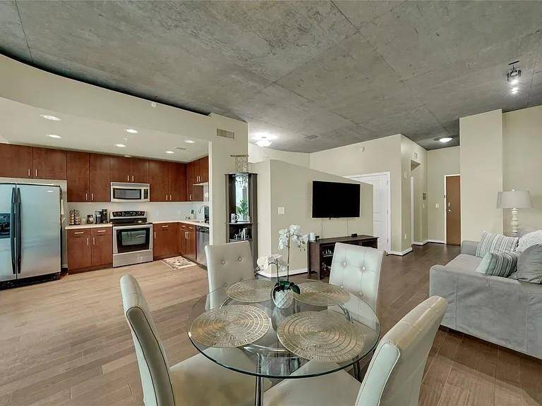Bright open-concept layout, perfect for seamless entertaining with stunning views from every angle!