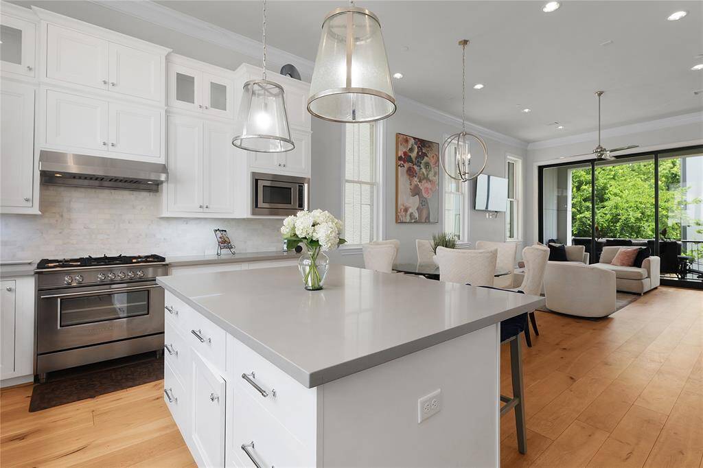 Welcome to 6113 Nicholas Grove Place, a private enclave with a balcony and rooftop terrace nestled in Memorial.