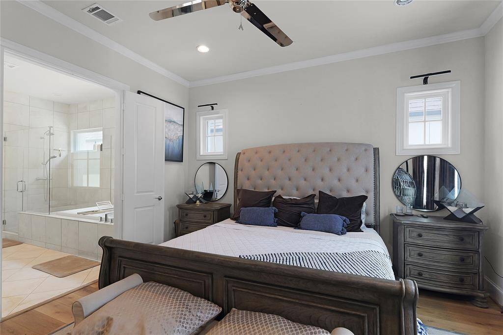 The primary suite pours into beautiful ensuite primary bath.