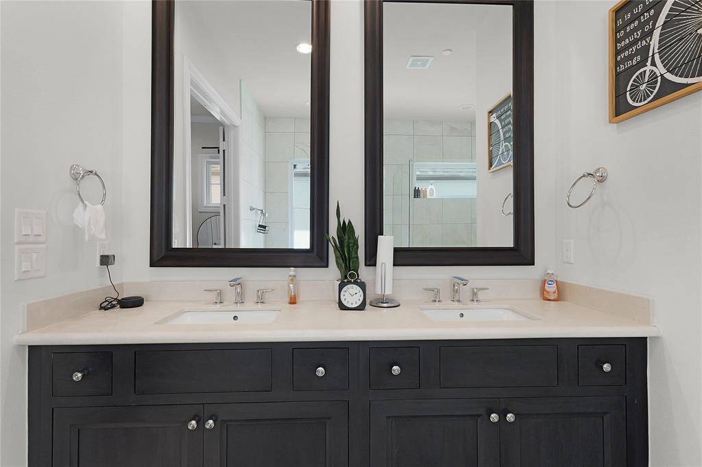 Dual vanity space, embellished with imperial white marble.