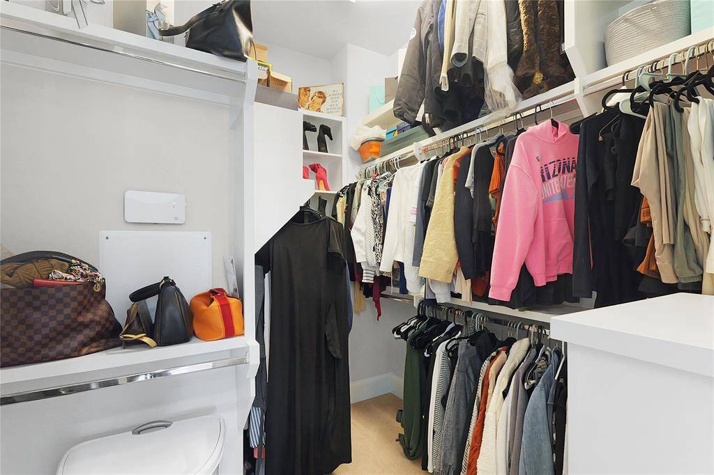 Designated his and her closets!