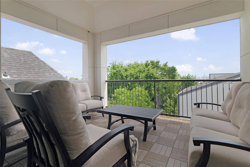 This private enclave boasts a terrace on the fourth story, perfect for hosting.