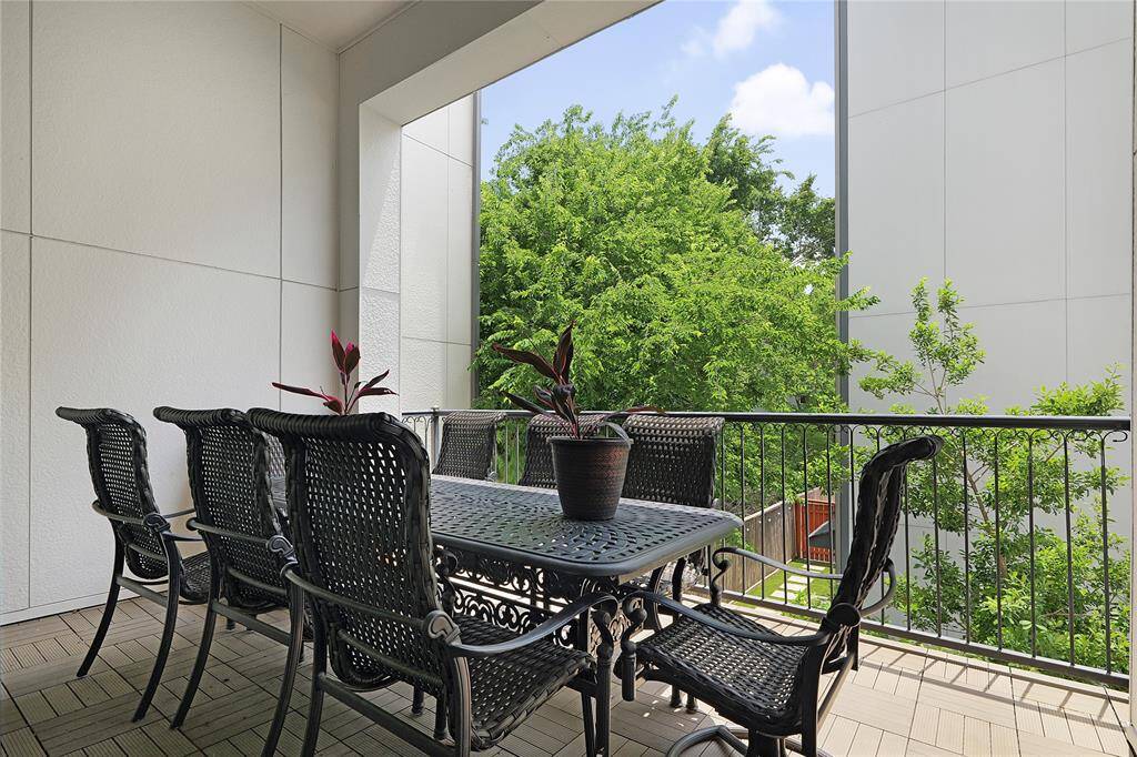 Alfresco dining space is displayed here on the oversized private balcony.