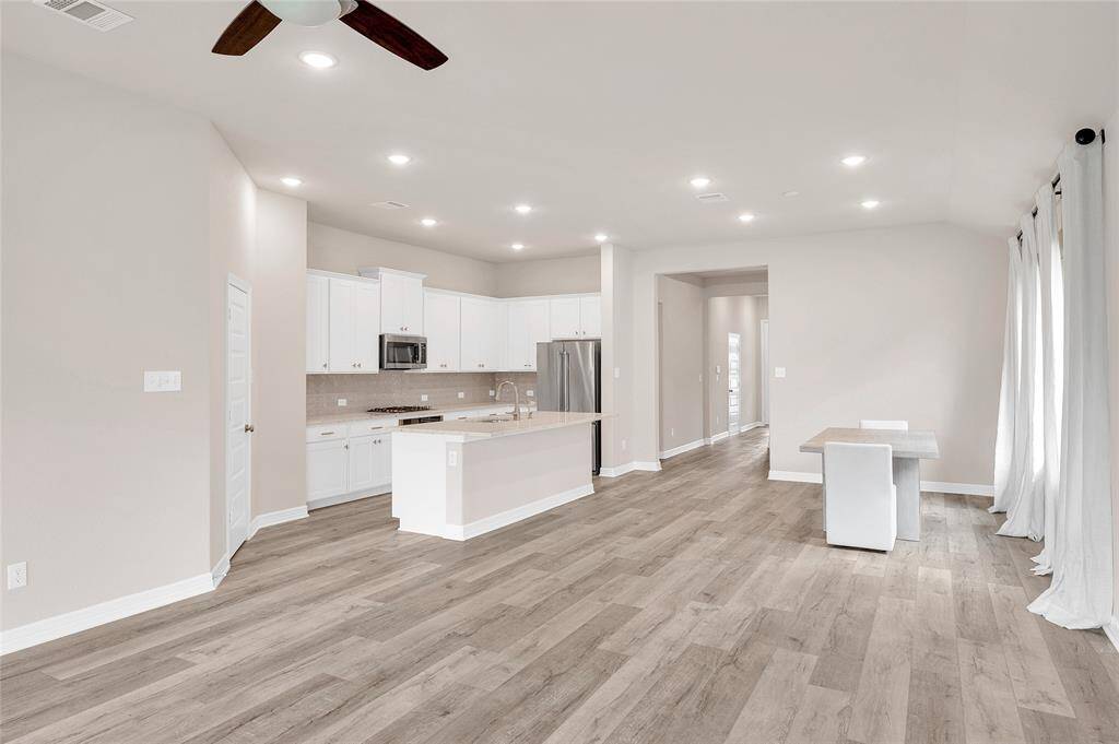 Open Floor Plan with Luxury Vinyl Plank Flooring