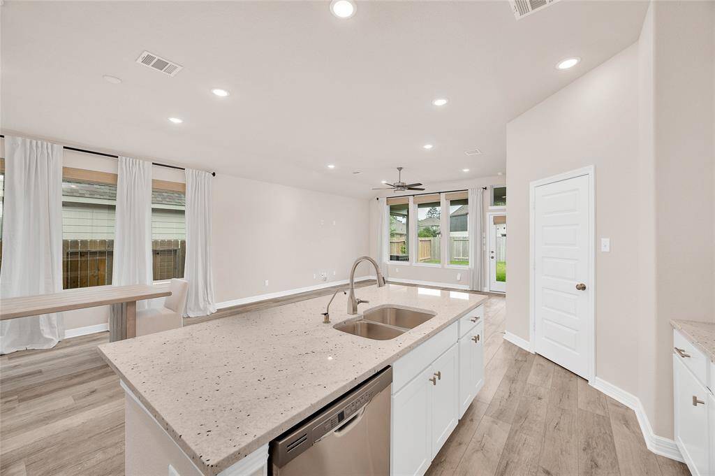 View from the Kitchen into the Dining Room & Family Room