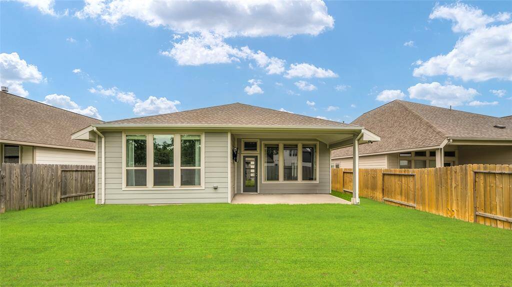 Back View of the Home. Please Note: All Grass has been Enhanced