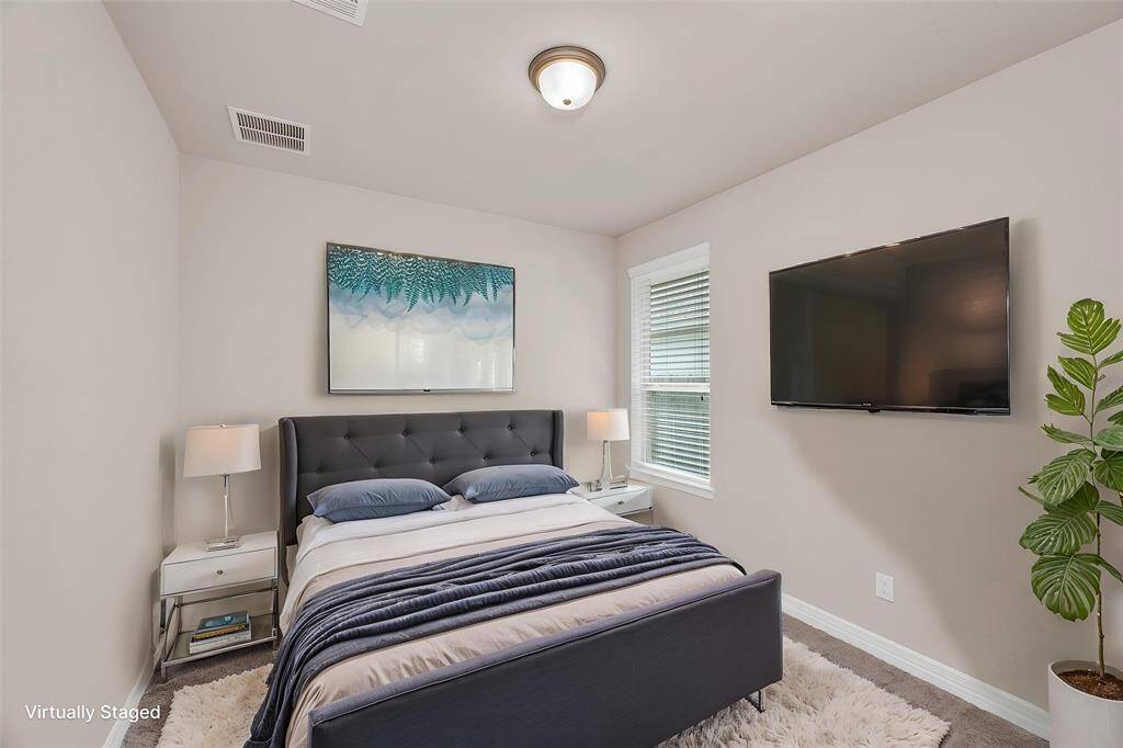 2nd Bedroom. PLease Note: TV is Virtually Staged