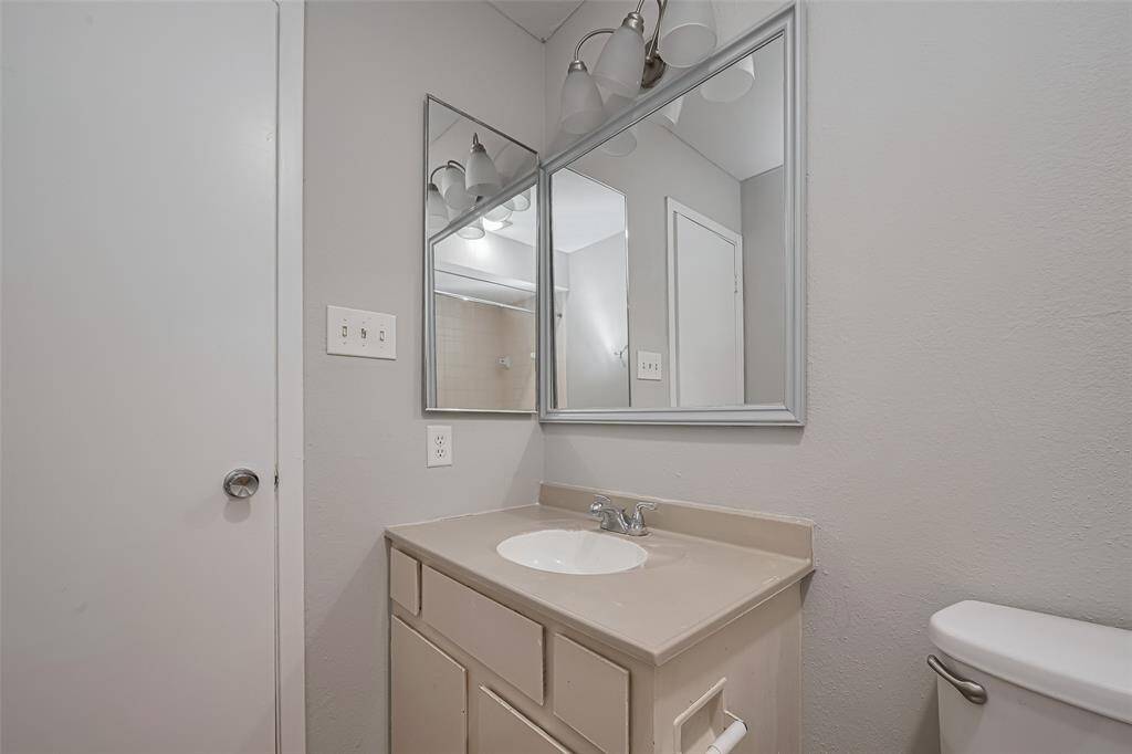 Neutral Vanity With Ample StorageA wide countertop, double mirrors, and generous cabinet space make this bathroom vanity both functional and easy to personalize.