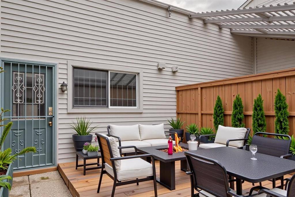 Charming Private PatioStep into your own outdoor retreat—this cozy wood-decked patio is perfect for morning coffee, container gardening, or intimate evening gatherings.